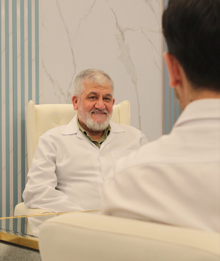 Dr. Nizar Abou Hassan with a patient